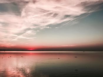 Scenic view of sea against sky at sunset