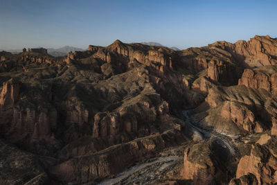 Aerial view of rocky landscape against sky