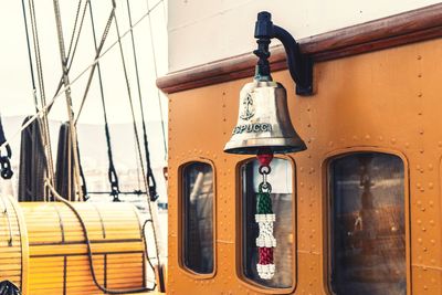 Close-up of bell hanging on vehicle 