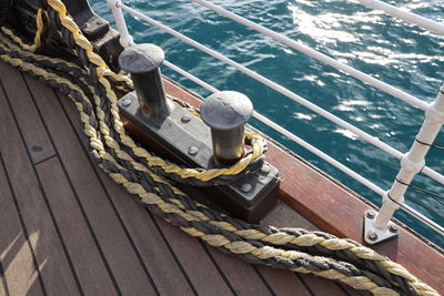 High angle view of sailboats moored on pier