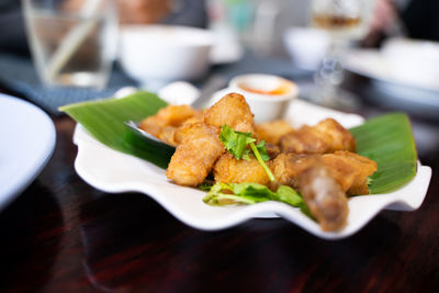 Close-up of food in plate on table