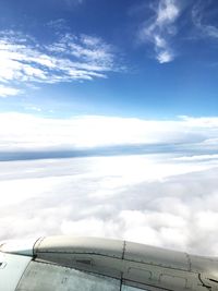 Scenic view of landscape against cloudy sky