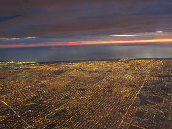 Aerial view of city during sunset