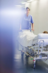 Nurse walking through corridor