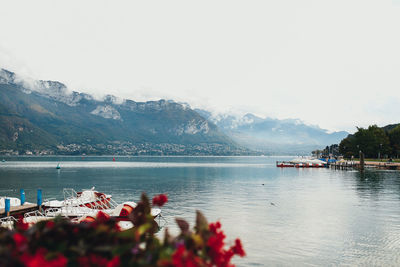 Scenic view of lake against cloudy sky