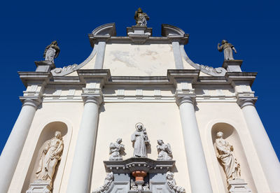 Low angle view of statue against sky