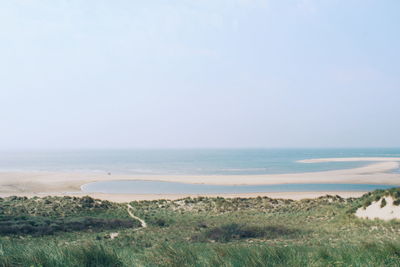 Scenic view of sea against clear sky