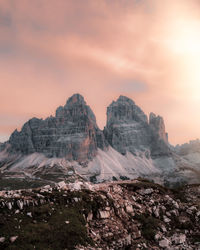 Scenic view of mountains against sky during sunrise