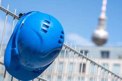 Low angle view of tower against blue sky