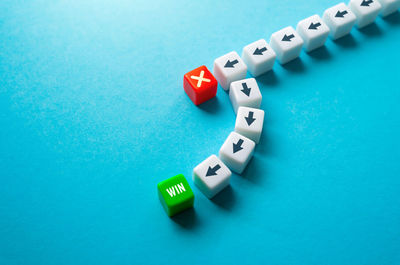 Close-up of toy blocks on blue background