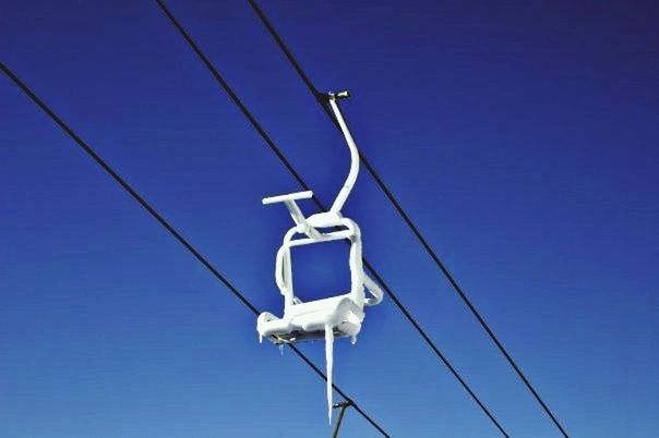 low angle view, blue, cable, electricity, power line, clear sky, power supply, connection, pole, technology, lighting equipment, fuel and power generation, street light, electricity pylon, copy space, hanging, sky, day, rope, power cable