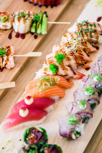 High angle view of sushi served on table