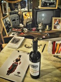Close-up of wine bottles on table
