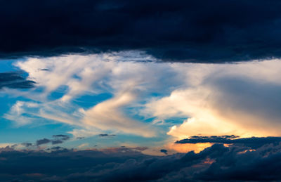 Low angle view of clouds in sky during sunset