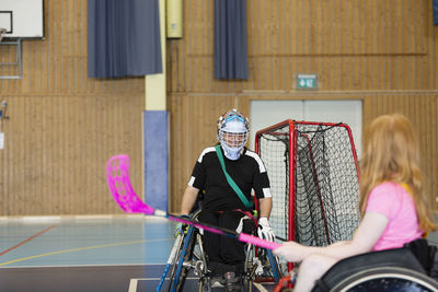 Disabled people playing in gym