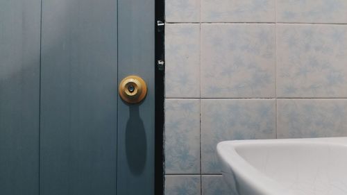 Cropped image of sink in bathroom