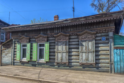 Exterior of old building against blue sky