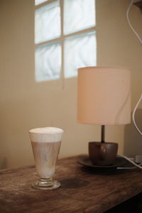 Close-up of beer glass on table