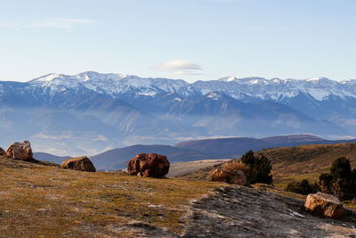 Scenic view of snowcapped mountains against sky