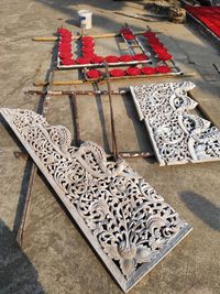 High angle view of chairs on table