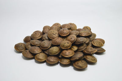 Close-up of coins on white background