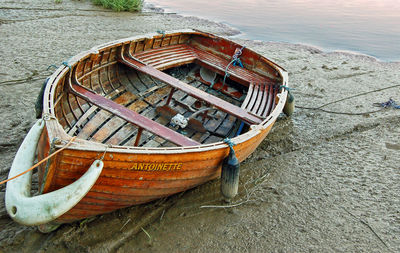 High angle view of boats moored at harbor