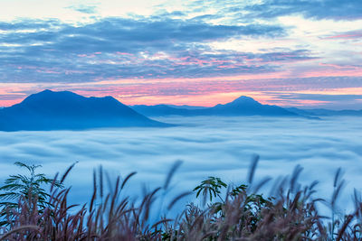 Scenic view of mountains against sky during sunset