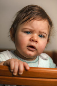 Close-up of cute baby at home