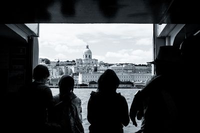 Tourists in front of building