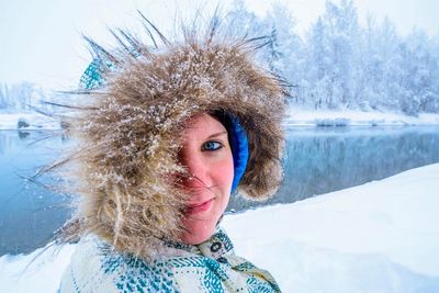 Portrait of woman wearing warm clothing during winter