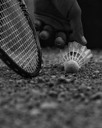 Close-up of hand playing with ball