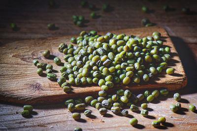 Close-up of roasted coffee beans on table