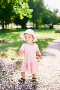 Full length of cute girl standing on land