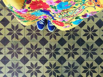 Low section of colorful pattern on tiled floor