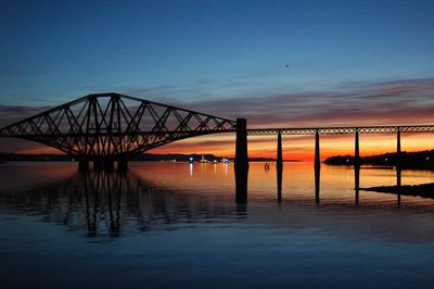 Bridge over sea against sky