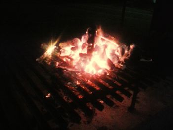 High angle view of bonfire at night