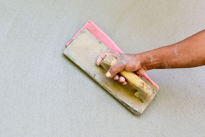 High angle view of man working on floor