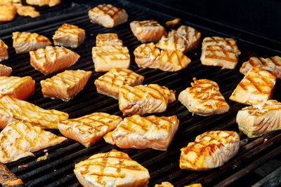 High angle view of meat on barbecue grill