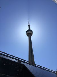 Low angle view of communications tower against sky