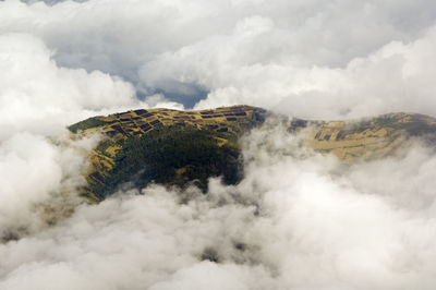 High angle view of landscape amidst clouds