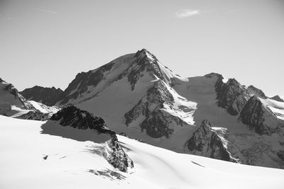 Scenic view of snowcapped mountain against sky