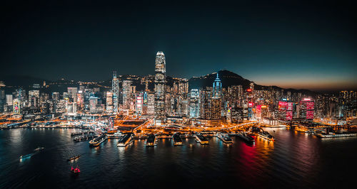 Illuminated buildings in city at night