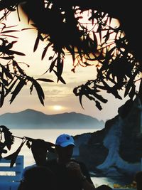 Portrait of silhouette people by tree against sky during sunset