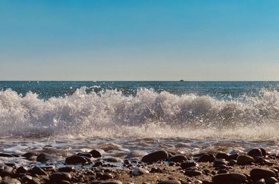 Scenic view of sea against clear sky