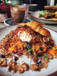 Close-up of food served on table