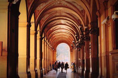 People walking in corridor