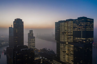 High angle view of buildings against sky during sunset