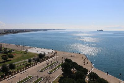 High angle view of road by sea against sky