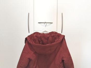 Close-up of clothes hanging on wall