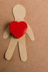 Directly above shot of heart shape made from paper